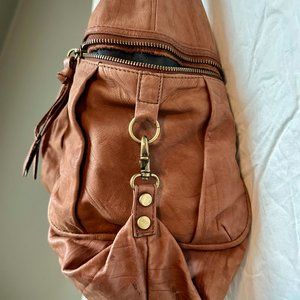 BCBGMaxAzria Brown Leather Hobo with antique gold hardware.